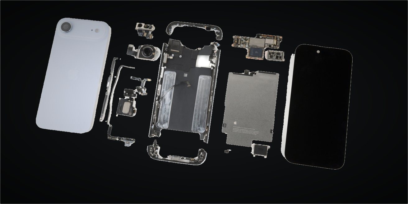 Every component of a disassembled iPhone laid out in order